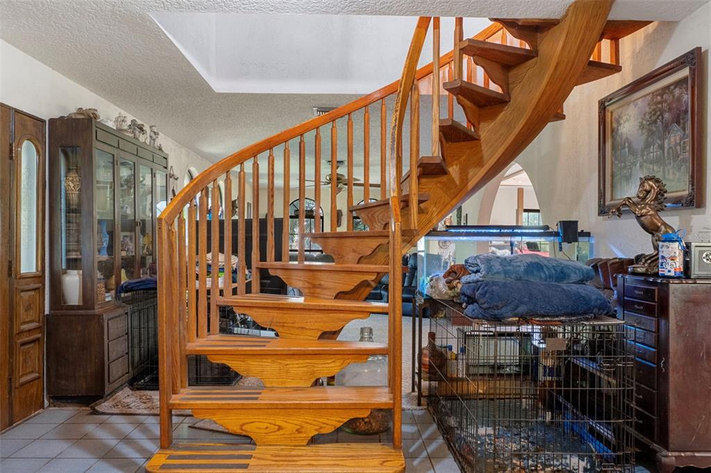 27910 Debbie Road Leesburg, FL 34748 - Photo 14 of 99 a view of entryway with wooden floor