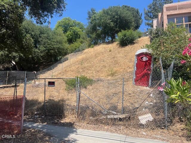 3120 North Verdugo Road Glendale, CA 91208 - Photo 4 of 6 a view of a wooden house with a yard