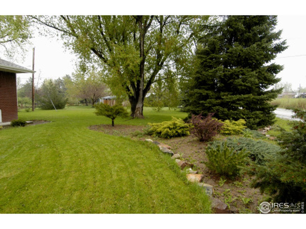 7631 Baseline Road Boulder, CO 80303 - Photo 11 of 12 a view of backyard with green space
