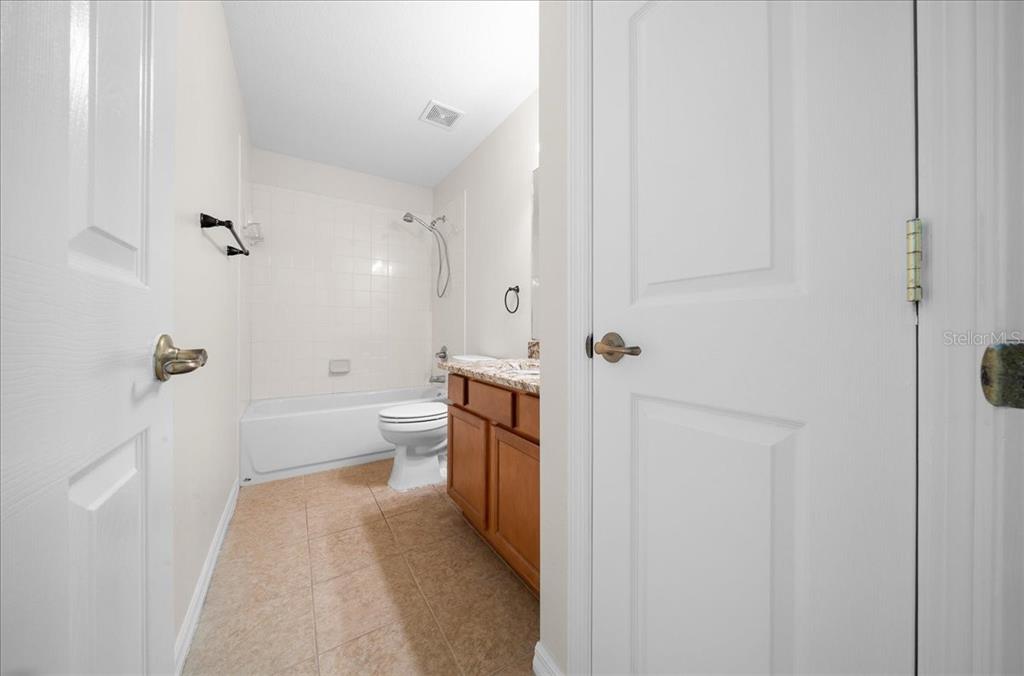 234 Locust Lane Ocala, FL 34472 - Photo 64 of 71 a bathroom with a sink a toilet and shower