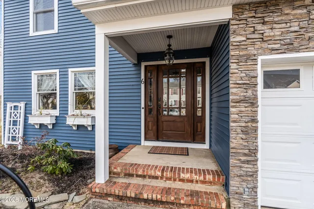 a view of a entryway door front of house