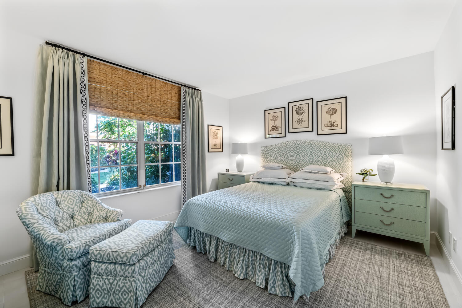 134 Peruvian Avenue, Unit 104 Palm Beach, FL 33480 - Photo 11 of 20 a bedroom with a bed and a large window