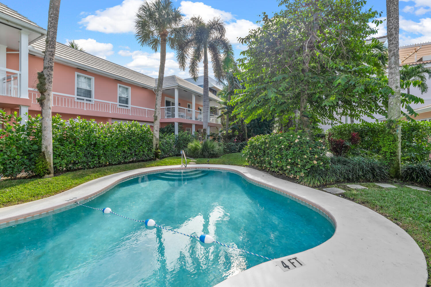 134 Peruvian Avenue, Unit 104 Palm Beach, FL 33480 - Photo 19 of 20 a view of a swimming pool with a yard