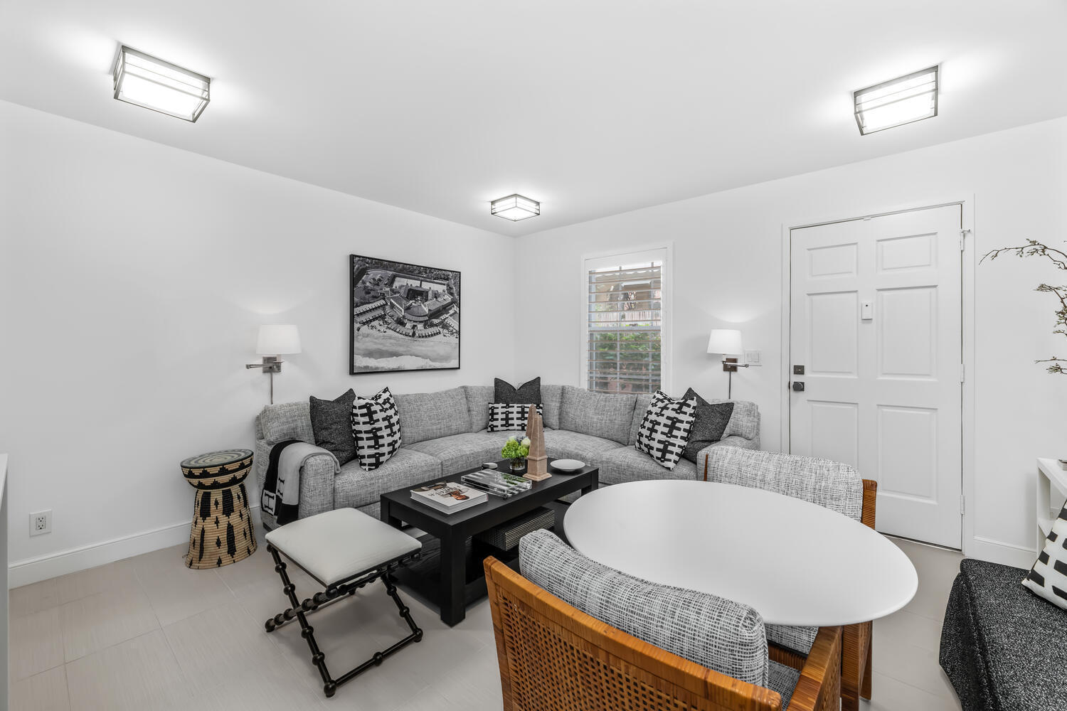 134 Peruvian Avenue, Unit 104 Palm Beach, FL 33480 - Photo 6 of 20 a living room with furniture a rug and a table
