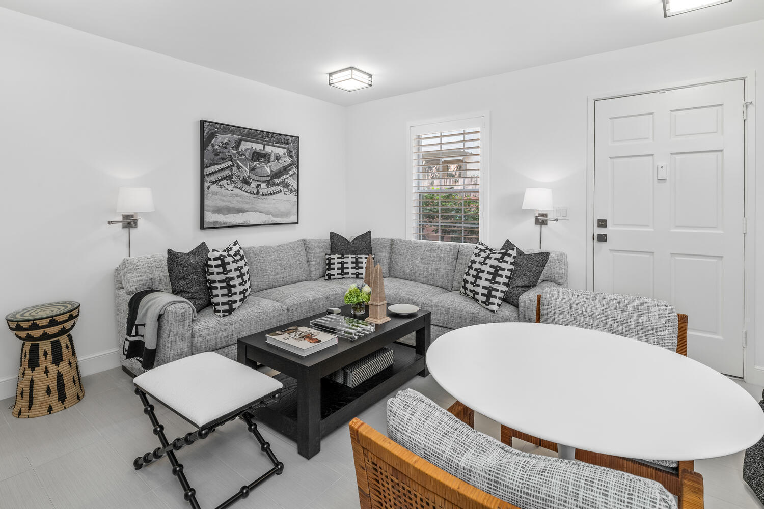 134 Peruvian Avenue, Unit 104 Palm Beach, FL 33480 - Photo 10 of 20 a living room with furniture a rug and a table