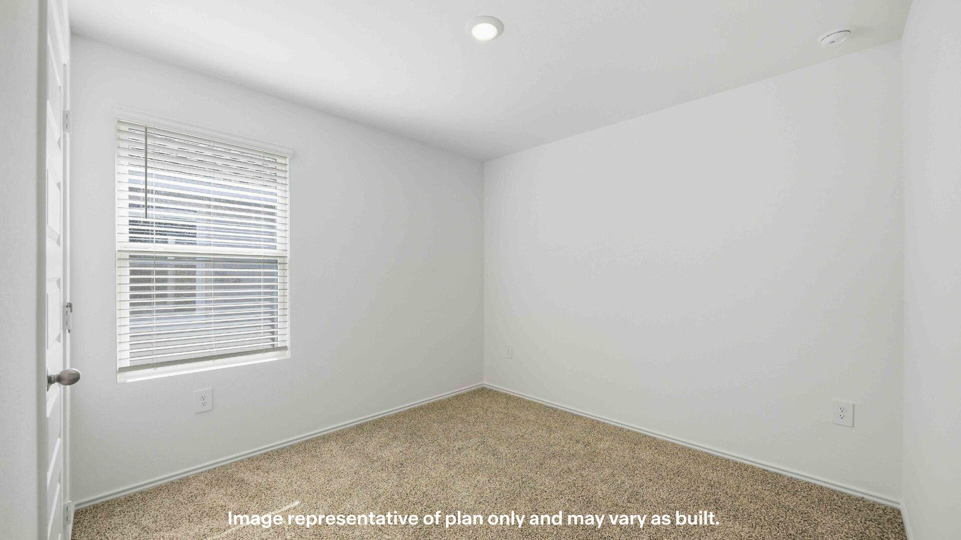 7441 10th Street Lubbock, TX 79416 - Photo 9 of 25 a view of an empty room with a window