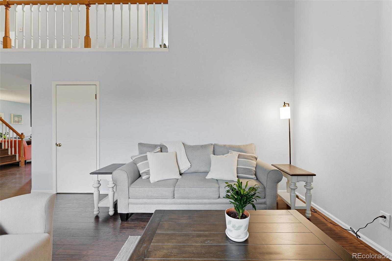 6080 Fenton Street Arvada, CO 80003 - Photo 14 of 48 a living room with furniture and a potted plant