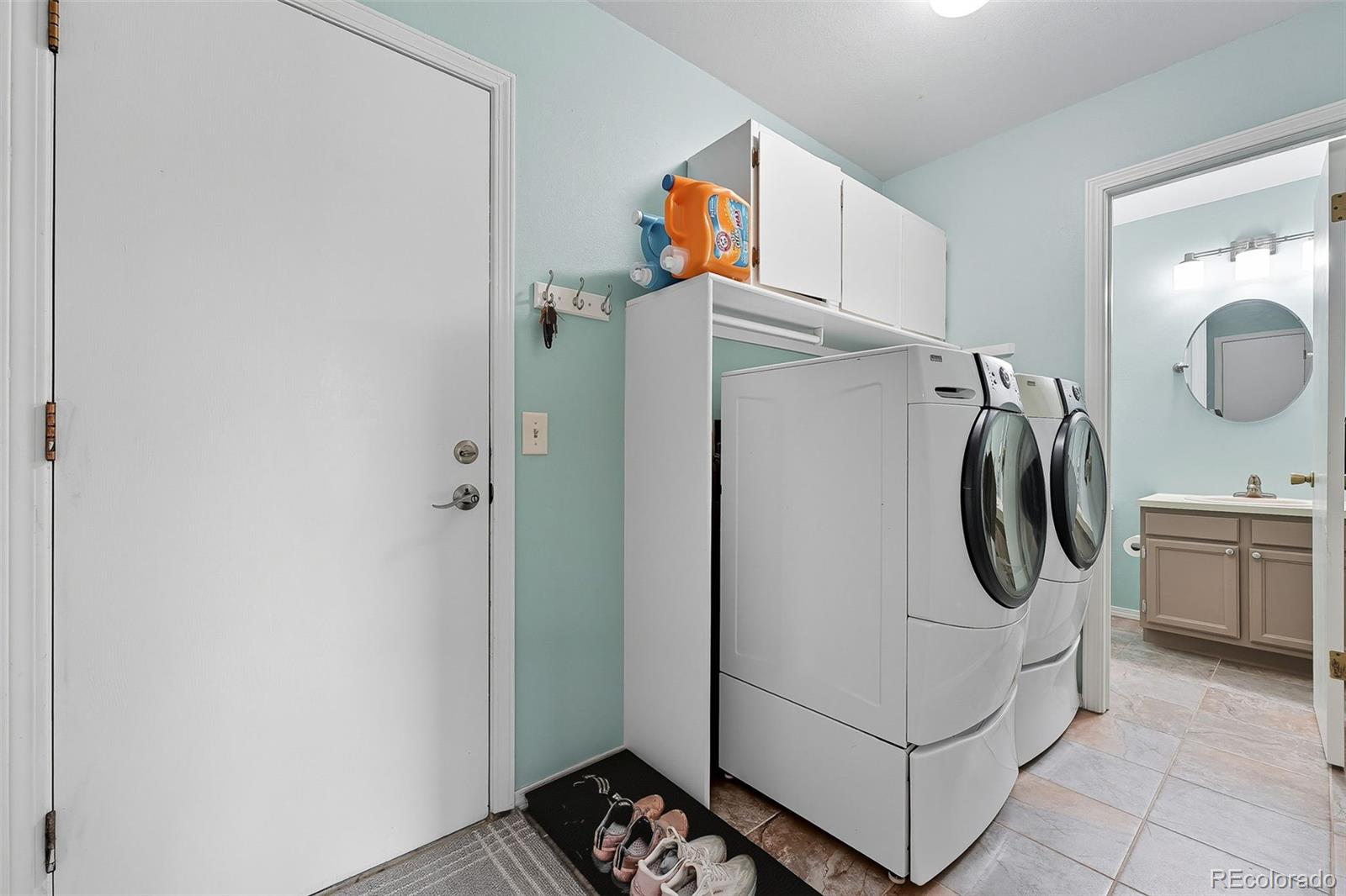 6080 Fenton Street Arvada, CO 80003 - Photo 24 of 48 a utility room with dryer and washer