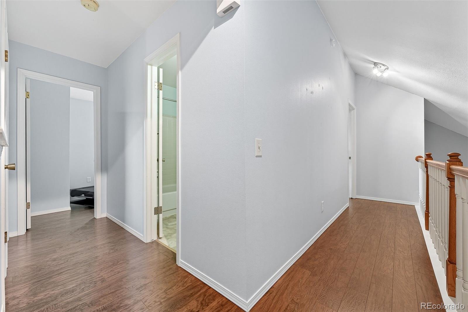6080 Fenton Street Arvada, CO 80003 - Photo 26 of 48 wooden floor in an empty room with a window