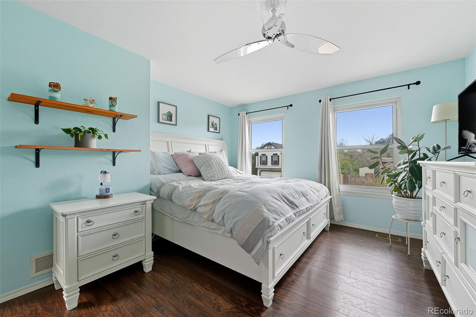 6080 Fenton Street Arvada, CO 80003 - Photo 28 of 48 a bedroom with a bed and a dresser