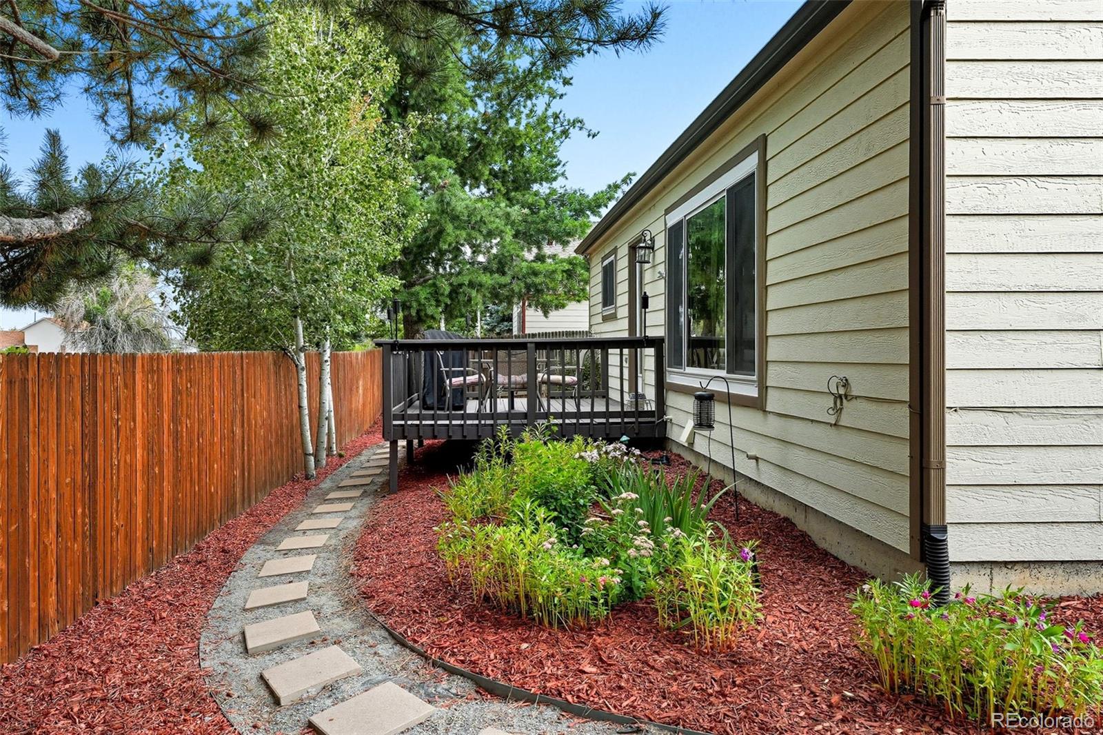 6080 Fenton Street Arvada, CO 80003 - Photo 47 of 48 a view of a back yard of a house