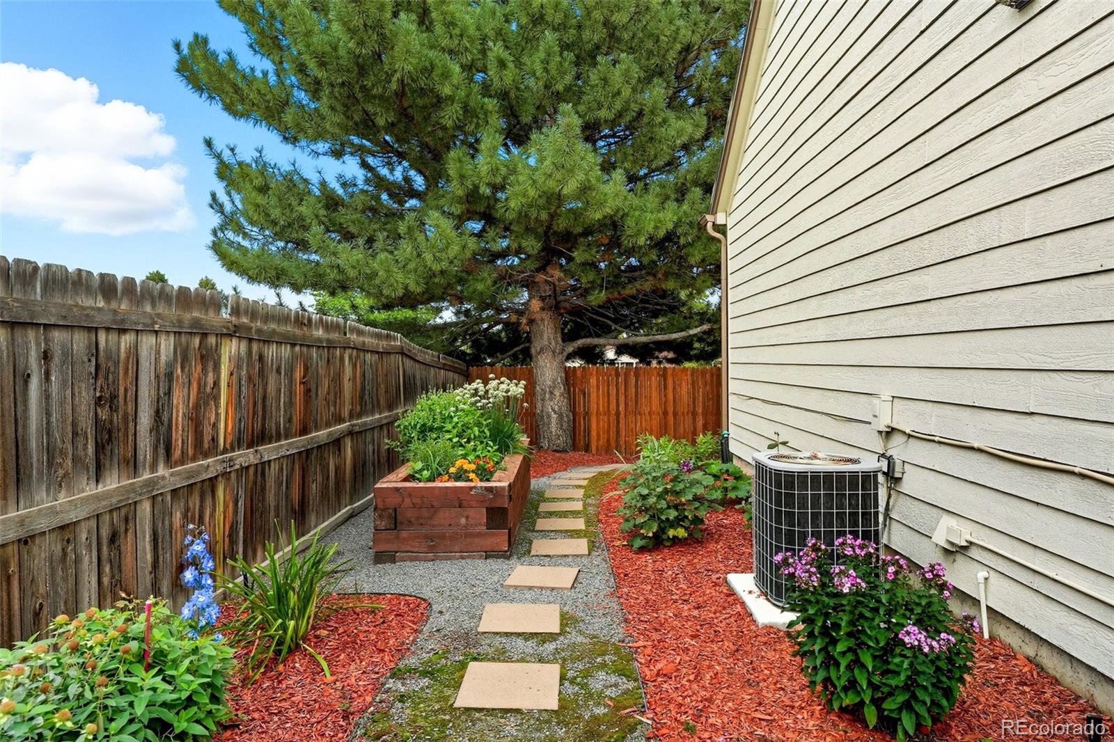6080 Fenton Street Arvada, CO 80003 - Photo 48 of 48 a garden view with a seating space