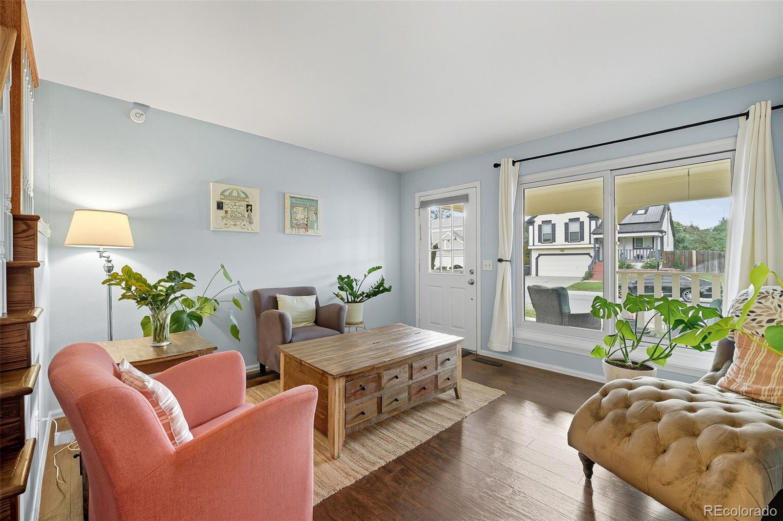 6080 Fenton Street Arvada, CO 80003 - Photo 5 of 48 a living room with furniture and a large window