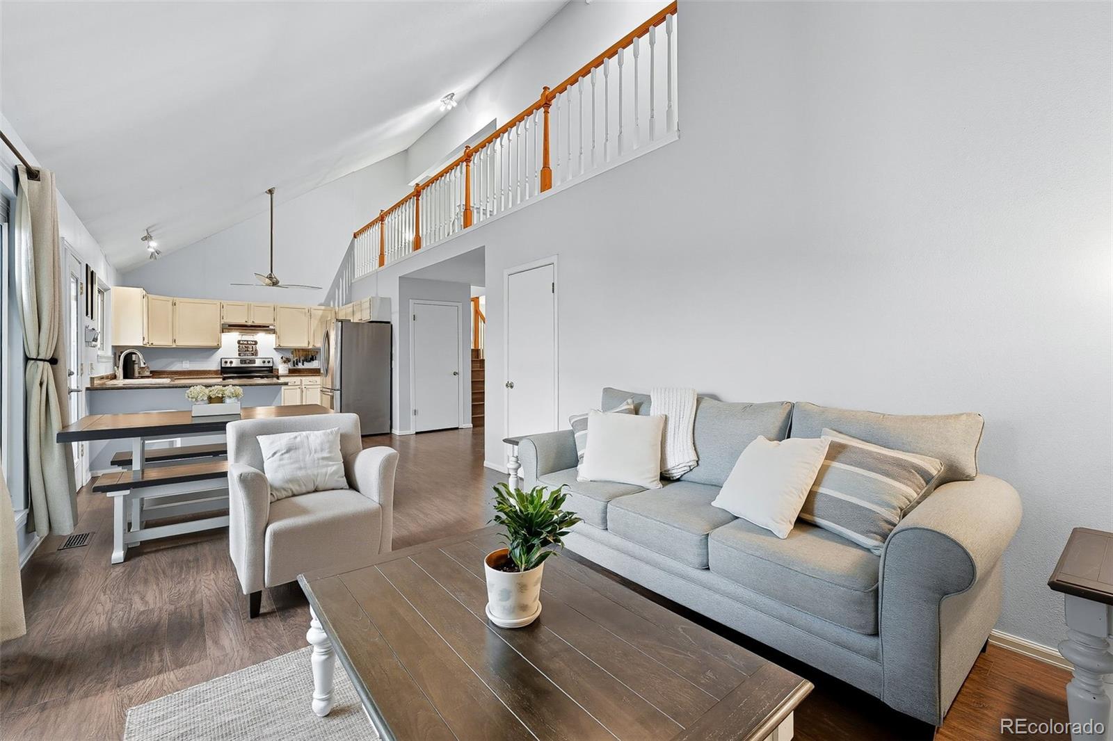 6080 Fenton Street Arvada, CO 80003 - Photo 7 of 48 a living room with furniture kitchen view and a window