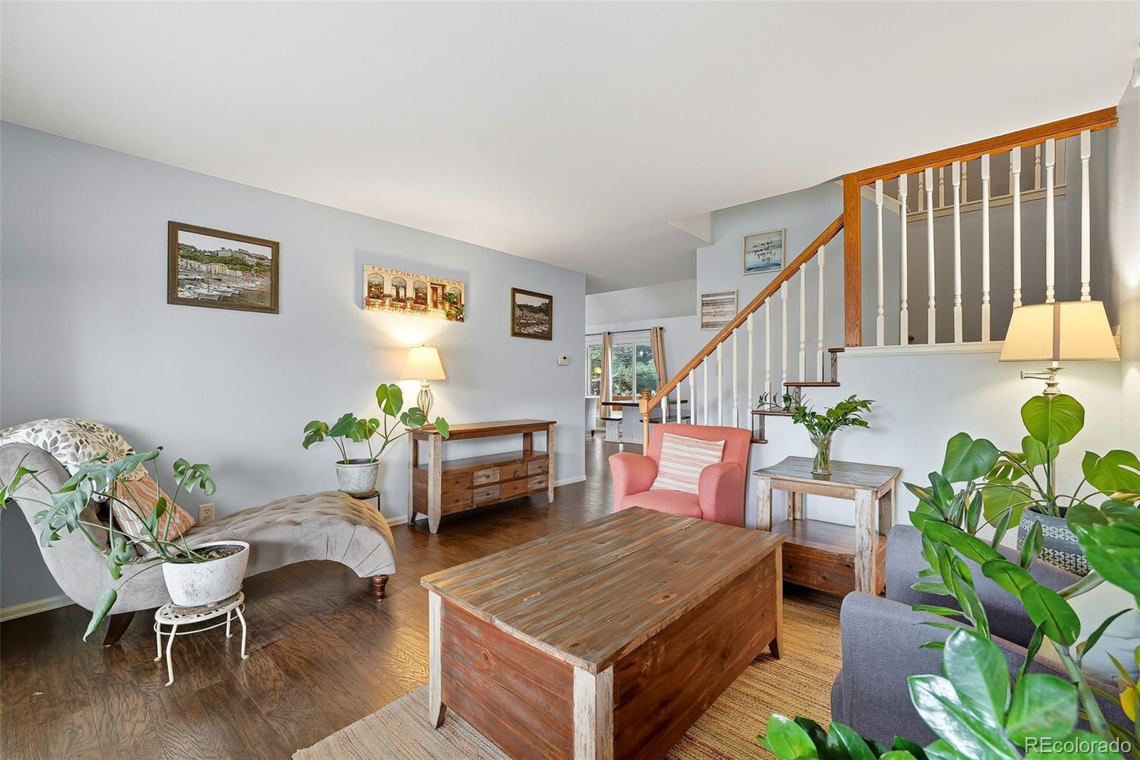 6080 Fenton Street Arvada, CO 80003 - Photo 8 of 48 a living room with furniture and a potted plant