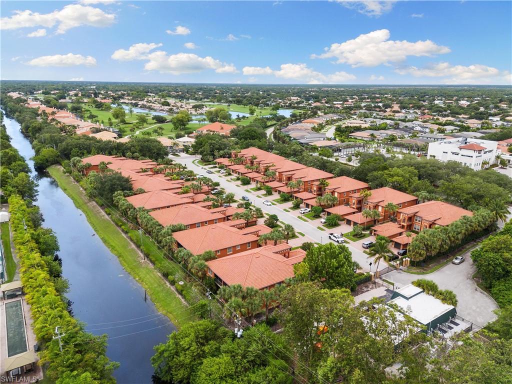 10021 Heather Lane, Unit 803 Naples, FL 34119 - Photo 27 of 41 an aerial view of residential houses with outdoor space