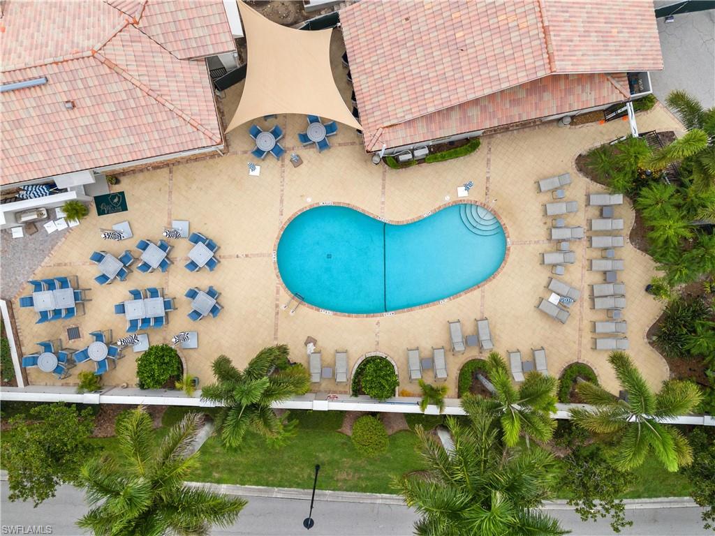 10021 Heather Lane, Unit 803 Naples, FL 34119 - Photo 32 of 41 an aerial view of a house with a swimming pool