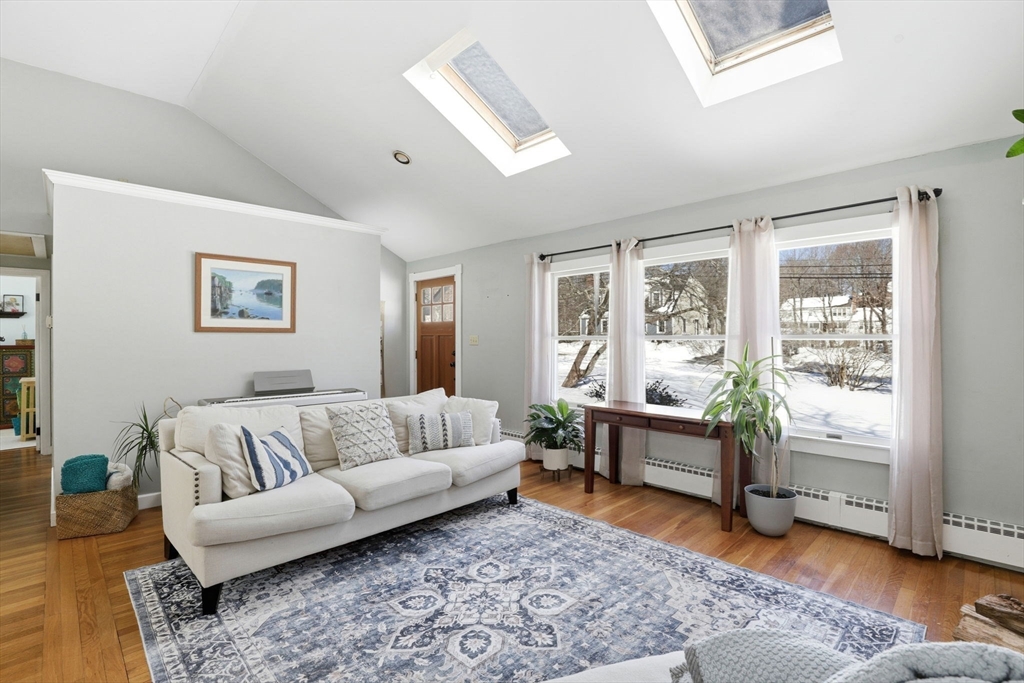 327 Country Way Scituate, MA 02066 - Photo 20 of 39 a living room with furniture and a rug