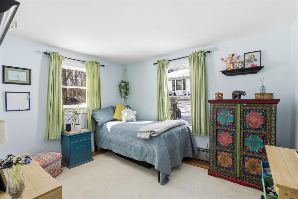 327 Country Way Scituate, MA 02066 - Photo 23 of 39 a bedroom with bed and a window