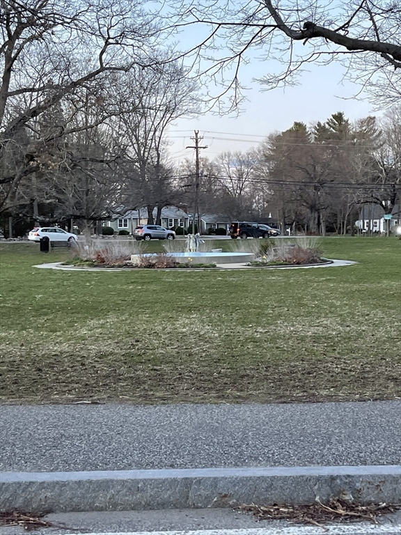 327 Country Way Scituate, MA 02066 - Photo 37 of 39 a view of a yard with a large trees