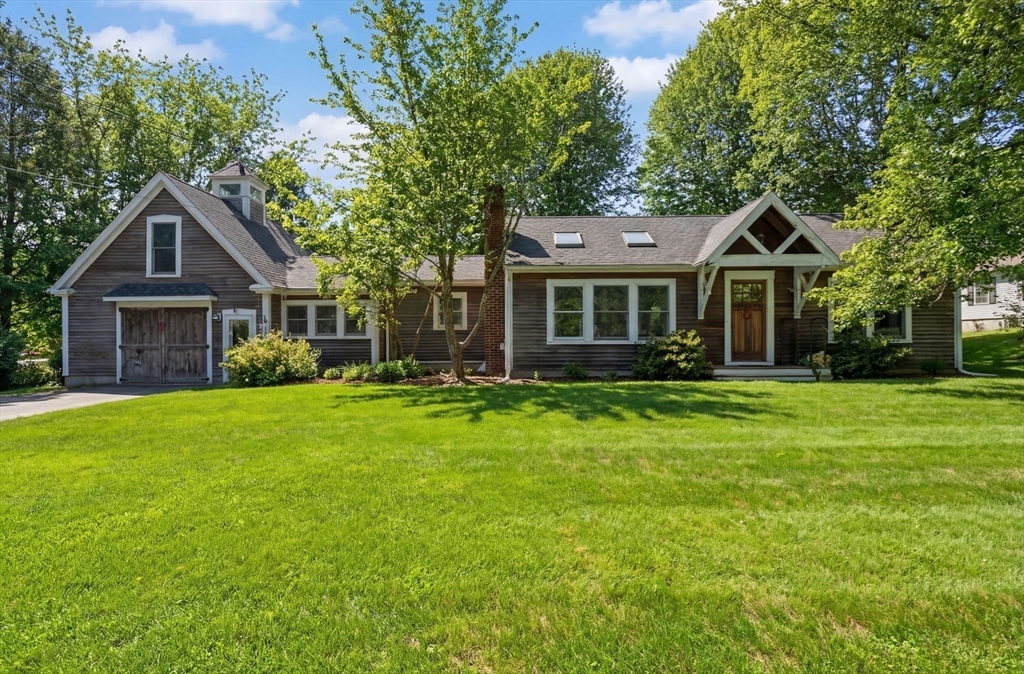 327 Country Way Scituate, MA 02066 - Photo 39 of 39 a front view of a house with a garden