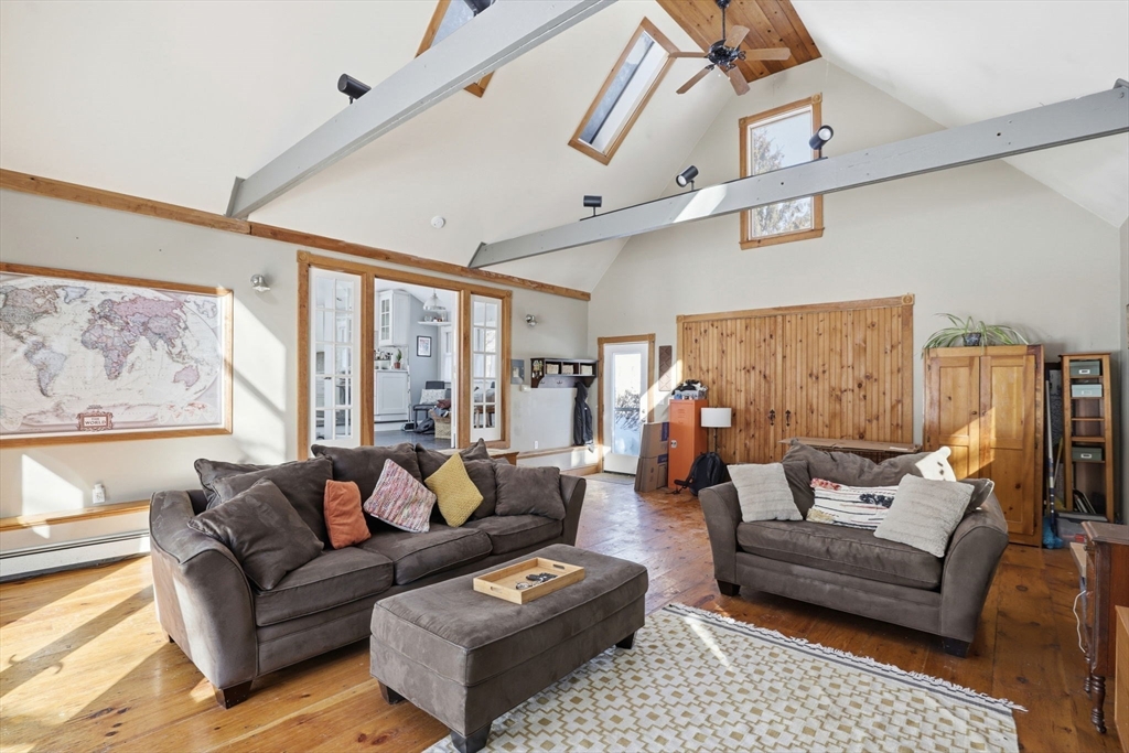 327 Country Way Scituate, MA 02066 - Photo 7 of 39 a living room with furniture and a large window