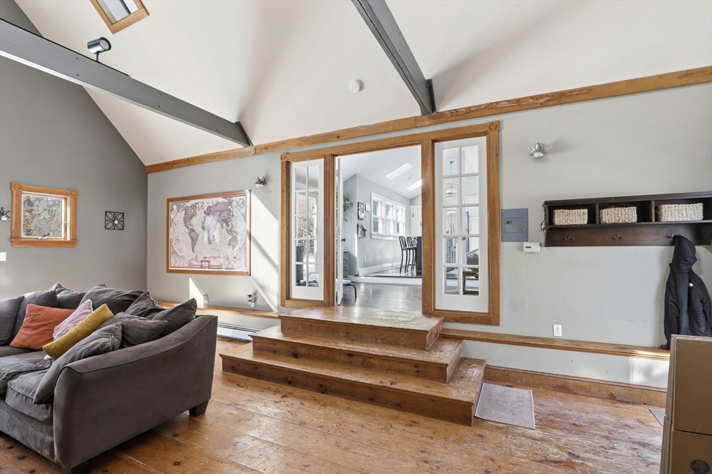 327 Country Way Scituate, MA 02066 - Photo 8 of 39 a living room with furniture and large windows