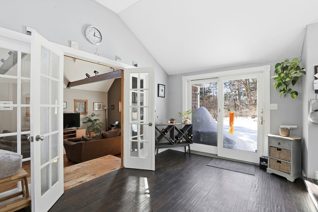 327 Country Way Scituate, MA 02066 - Photo 10 of 39 a living room with furniture and a wooden floor