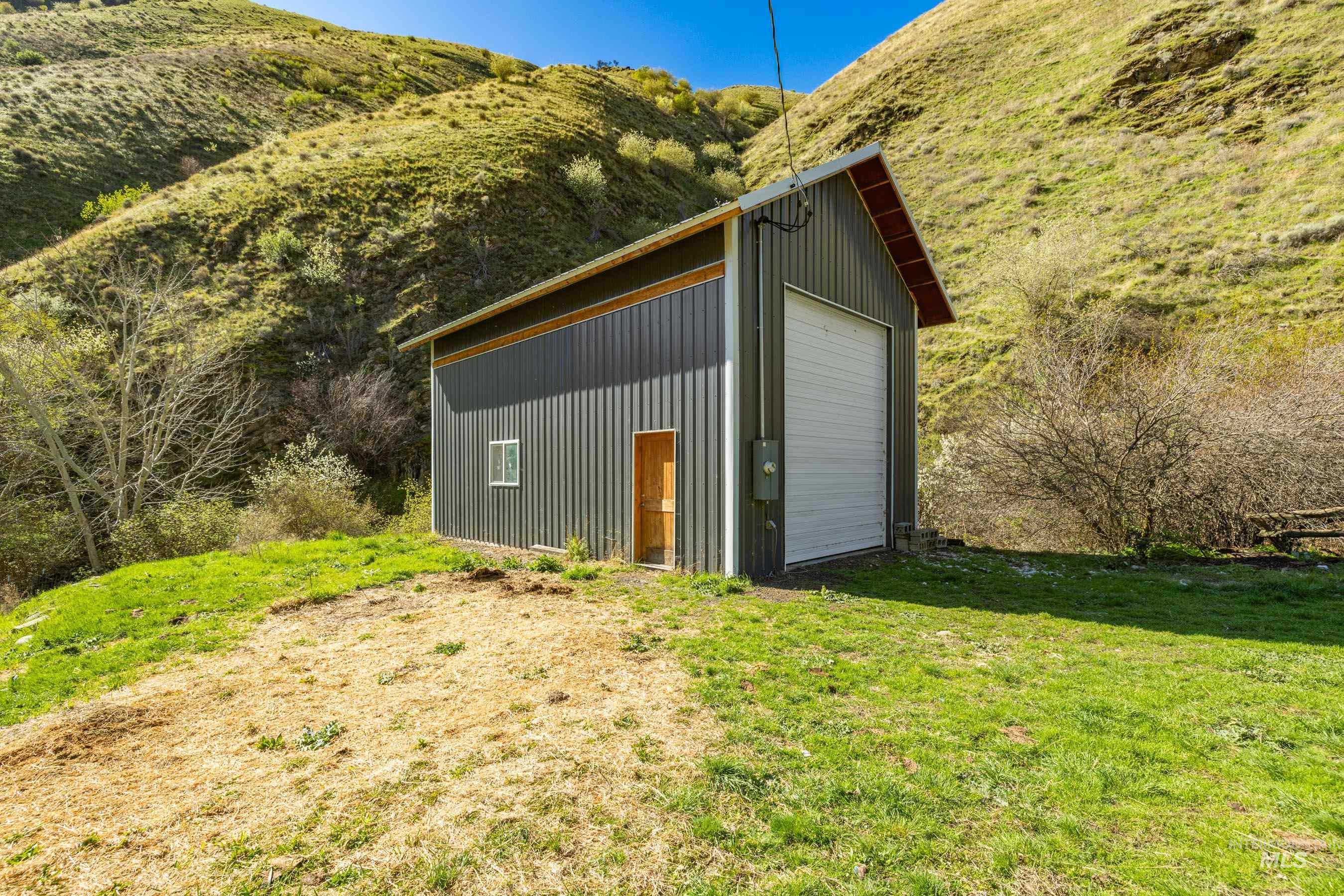 221 Seven Devils Road Riggins, ID 83549 - Photo 26 of 46 View of outdoor structure with a mountain view