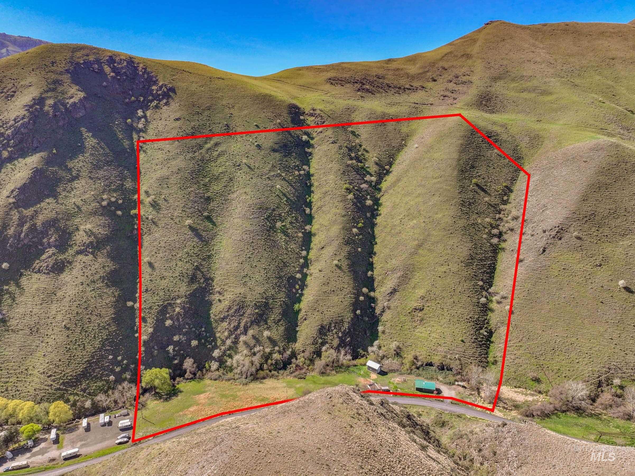 221 Seven Devils Road Riggins, ID 83549 - Photo 41 of 46 View of property location with a mountain backdrop and property boundaries highlighted