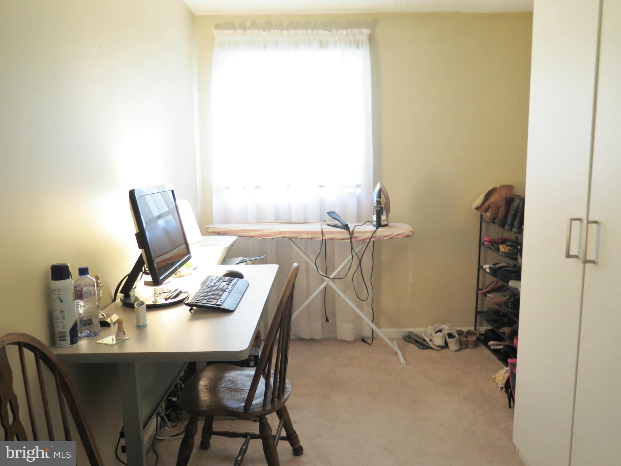 7867 Kavanagh Road Baltimore, MD 21222 - Photo 23 of 29 a view of a workspace with furniture