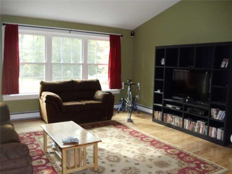 107 Johnson Road Gray, ME 04039 - Photo 6 of 21 Living Room. Living room has vaulted...