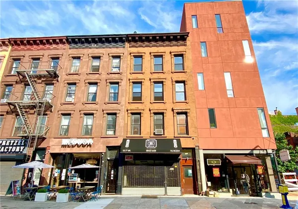 a front view of a building with street