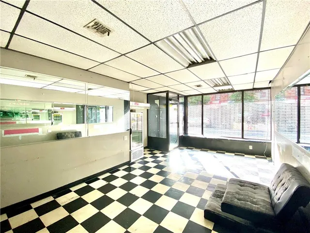a view of a chairs and table in the patio