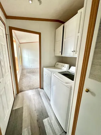 a utility room with a window dryer and washer
