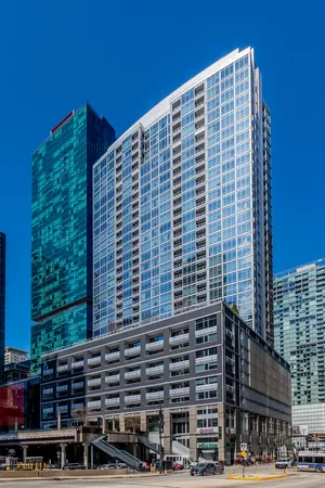a front view of a building with street view