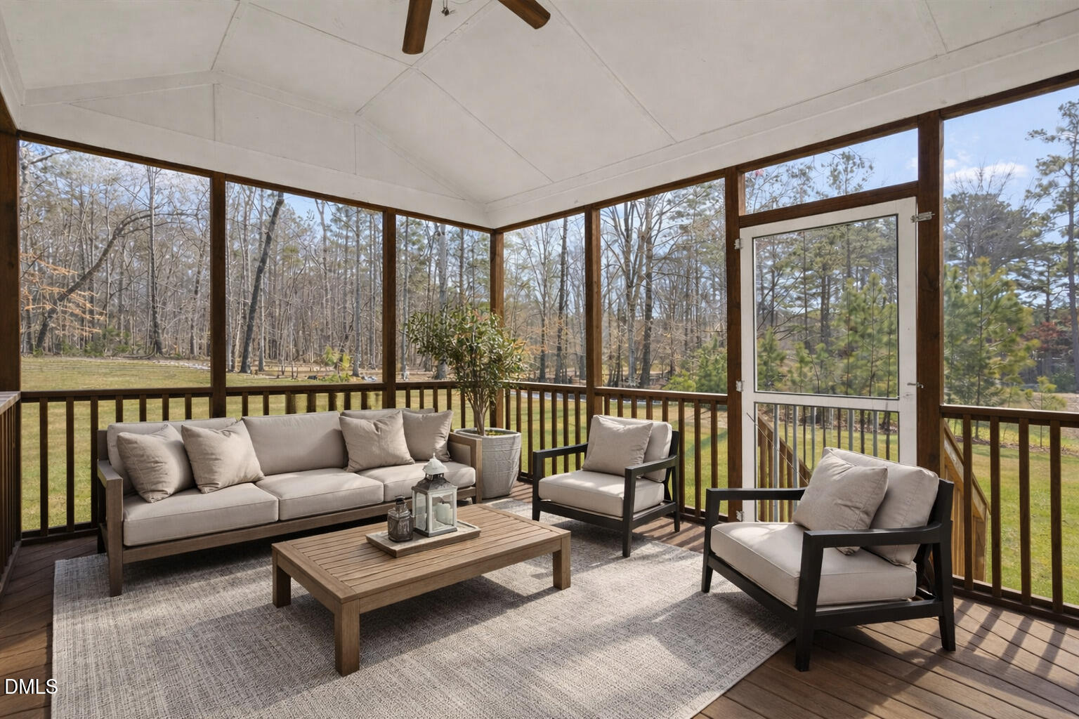 2301 Greenbrook Lane Durham, NC 27705 - Photo 11 of 42 a living room with furniture and a floor to ceiling window