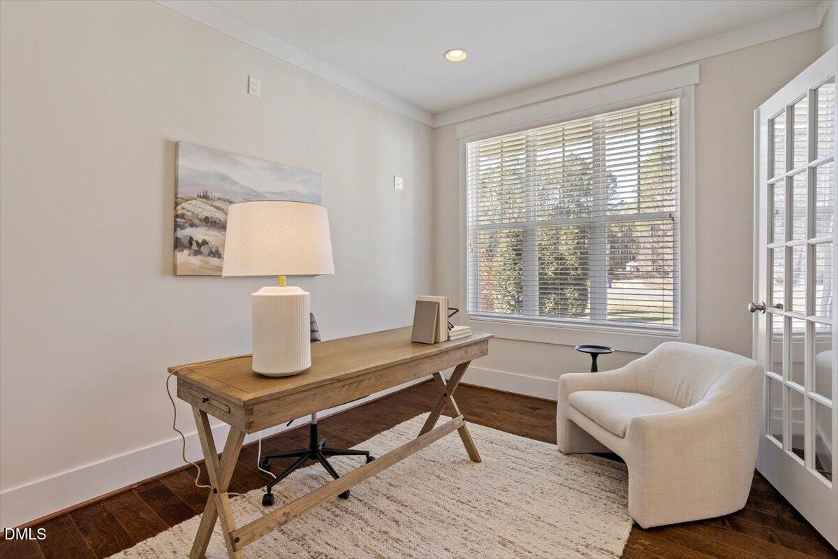2301 Greenbrook Lane Durham, NC 27705 - Photo 15 of 42 a living room with furniture and a window