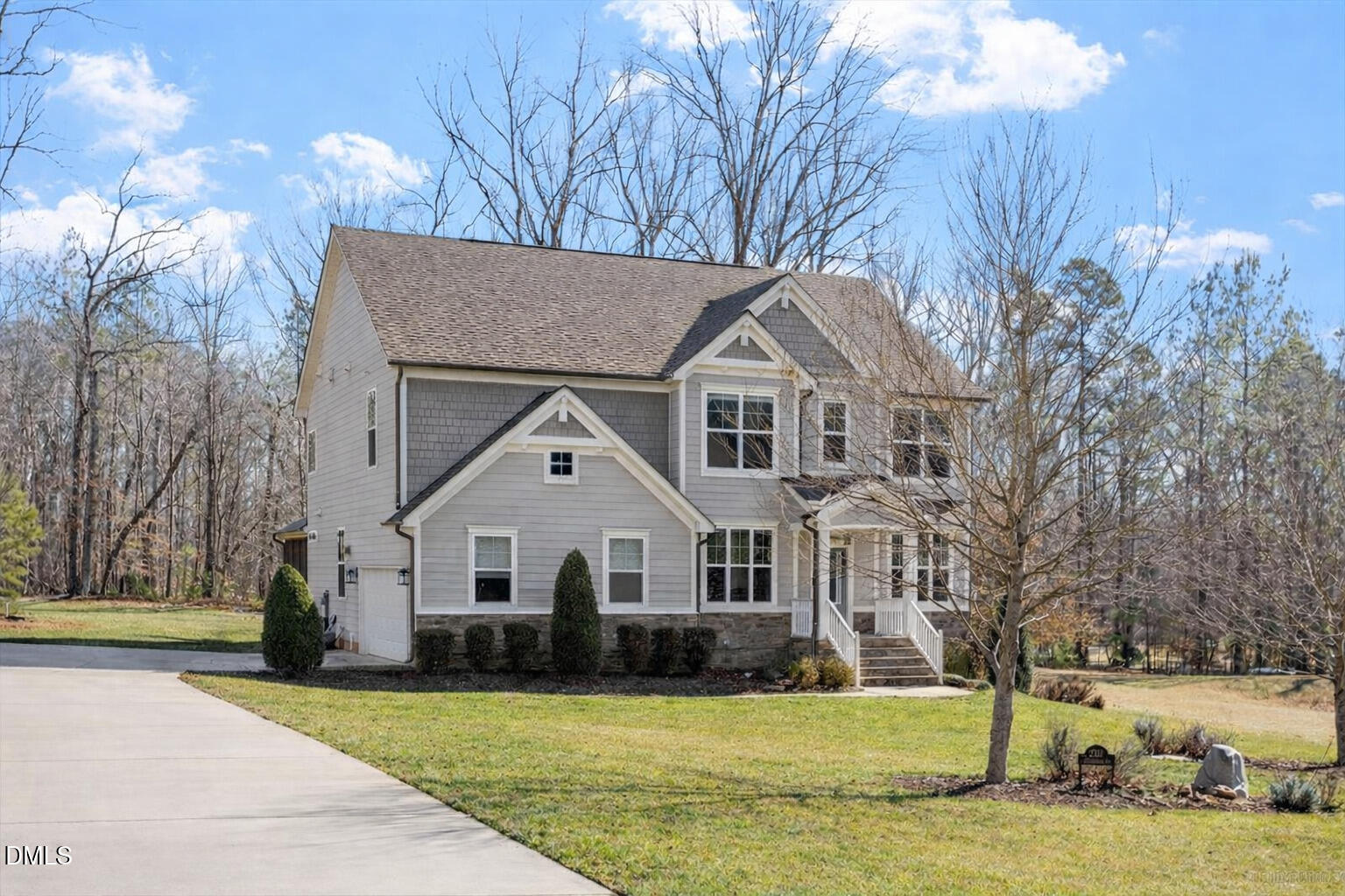 2301 Greenbrook Lane Durham, NC 27705 - Photo 5 of 42 a front view of a house with a yard