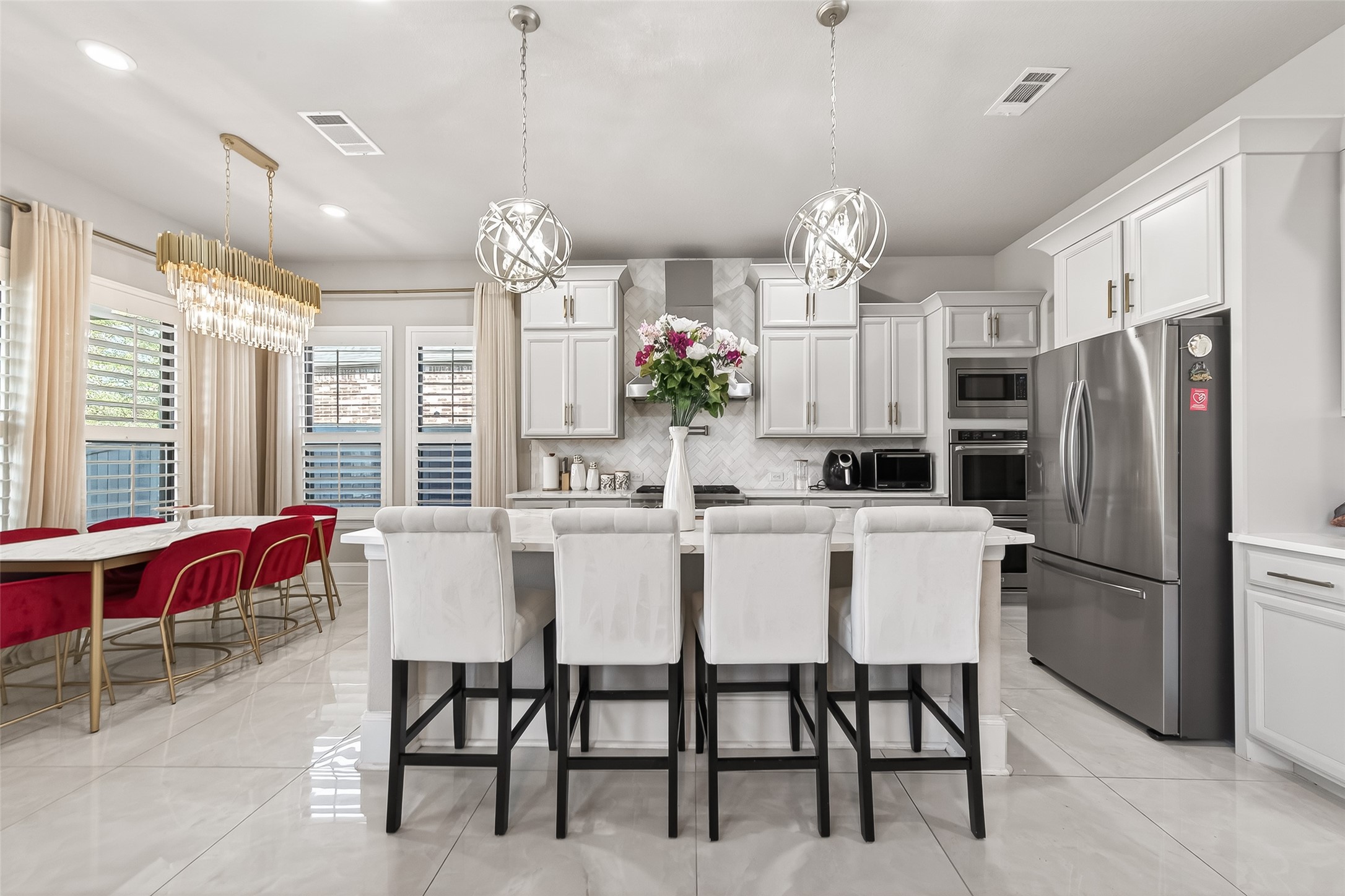 1122 Thyme Rise Lane Richmond, TX 77406 - Photo 18 of 50 a dining room with furniture a chandelier and window