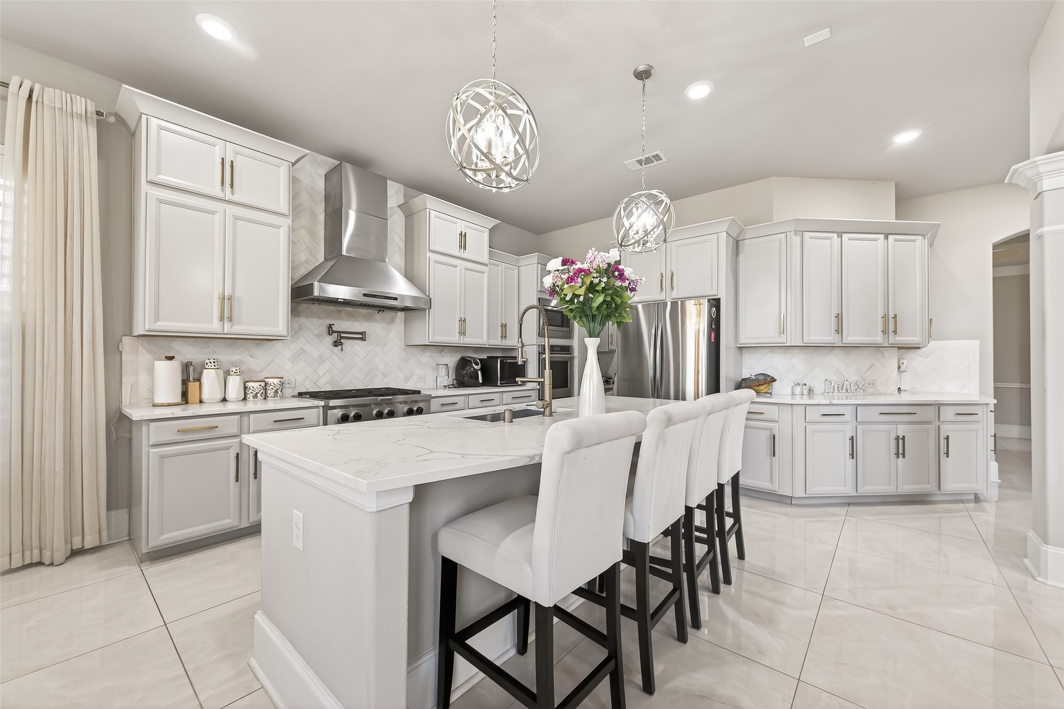 1122 Thyme Rise Lane Richmond, TX 77406 - Photo 25 of 50 a kitchen with a white cabinets and white appliances