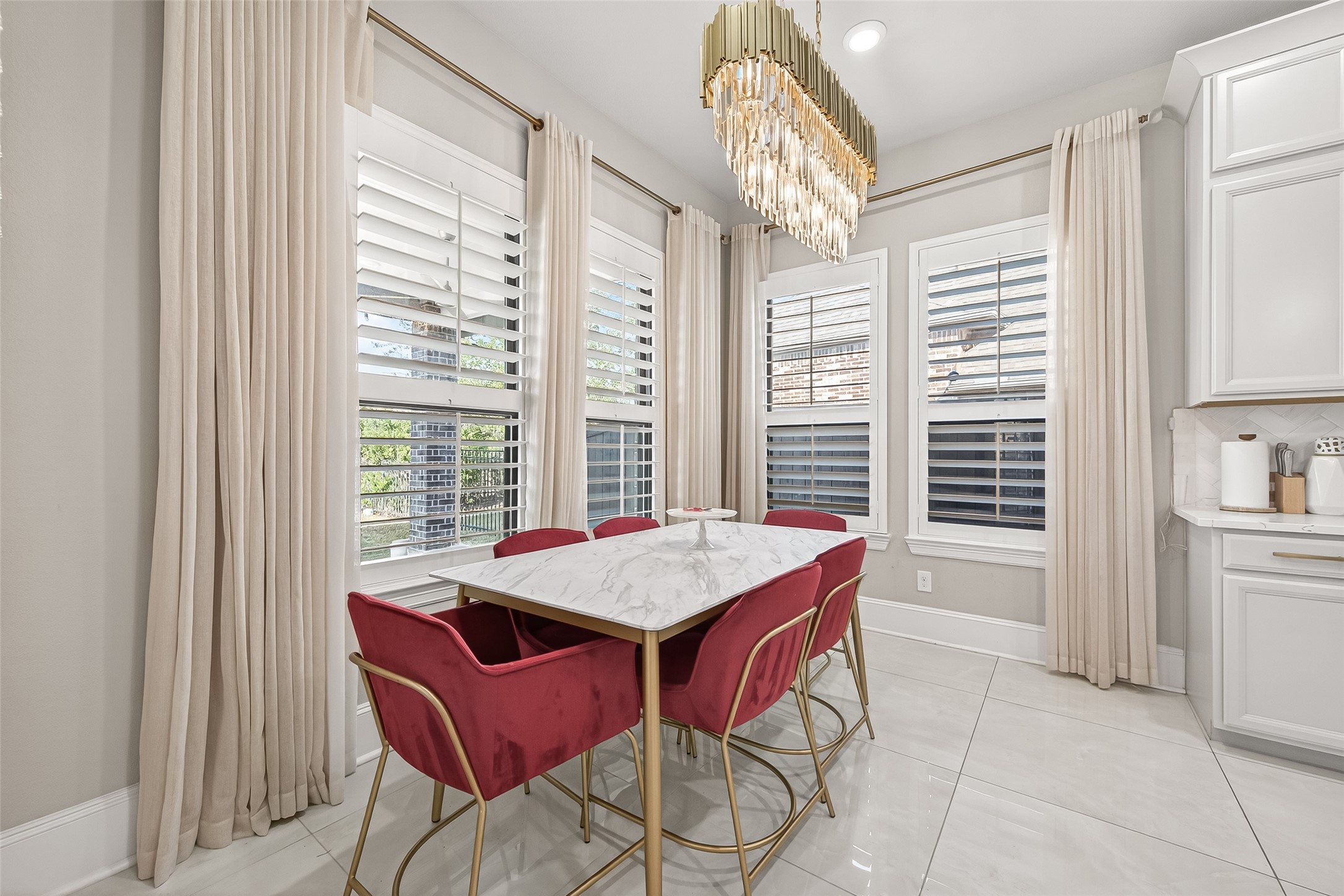 1122 Thyme Rise Lane Richmond, TX 77406 - Photo 26 of 50 a dining room with a window and table