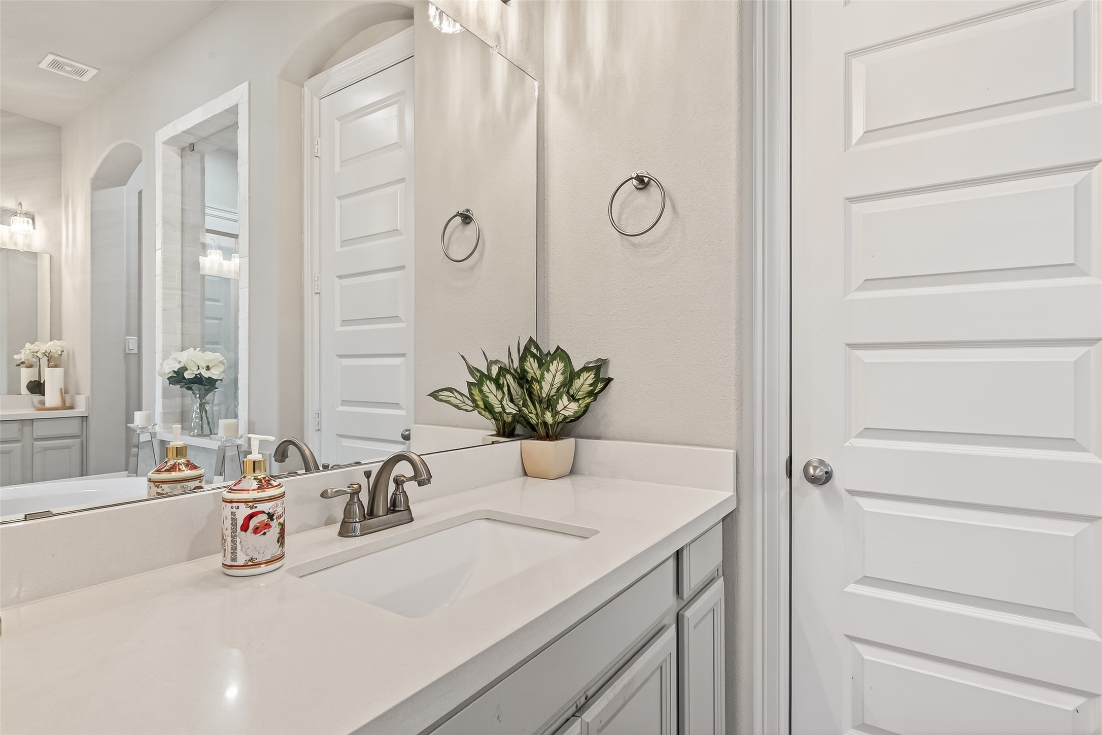 1122 Thyme Rise Lane Richmond, TX 77406 - Photo 31 of 50 a bathroom with a sink and a mirror