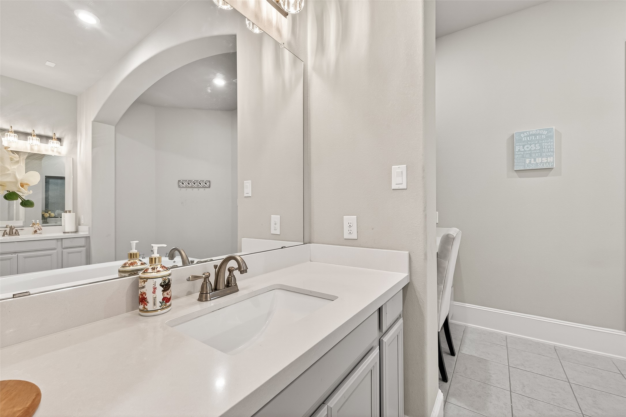 1122 Thyme Rise Lane Richmond, TX 77406 - Photo 34 of 50 a bathroom with a sink and a mirror