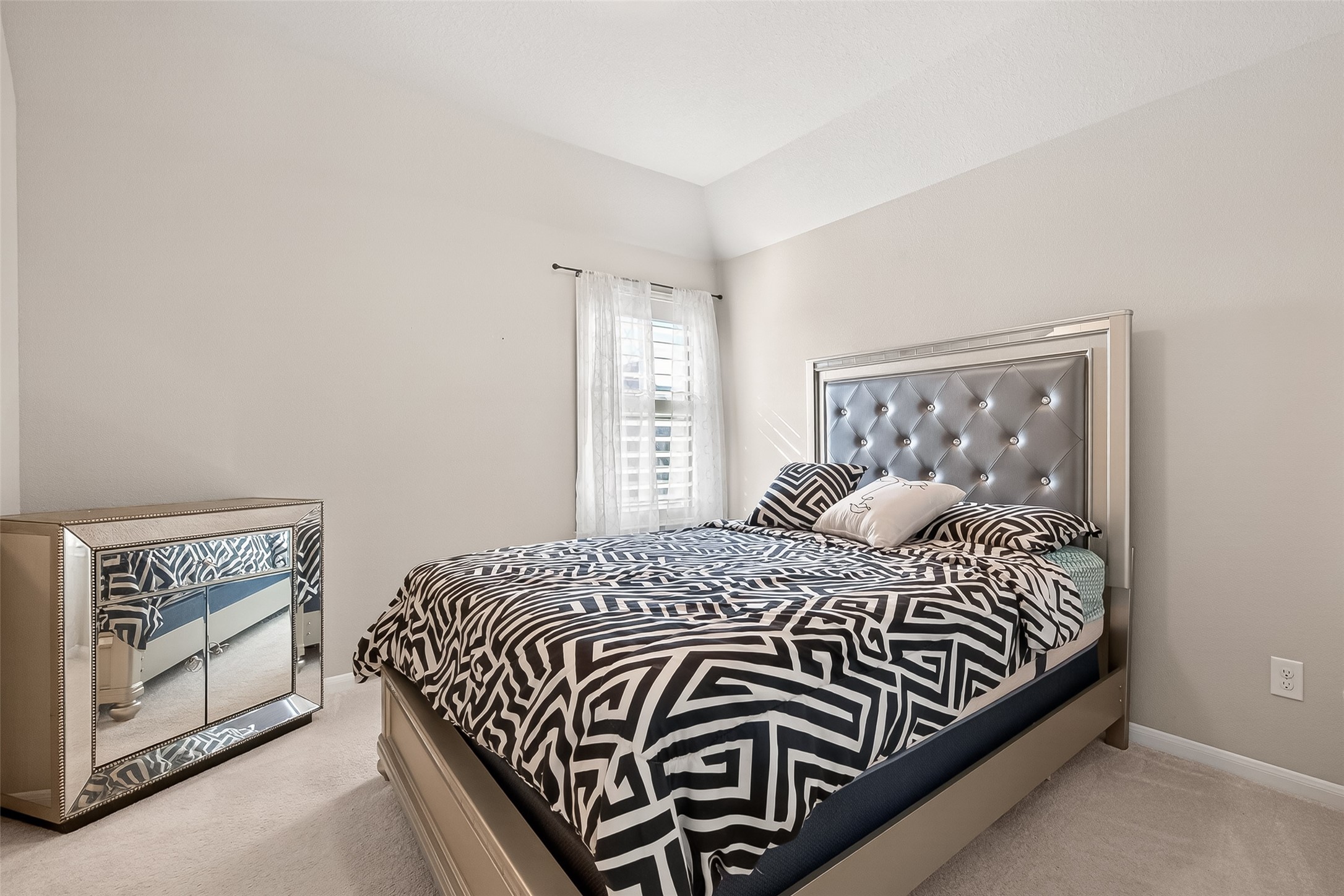 1122 Thyme Rise Lane Richmond, TX 77406 - Photo 40 of 50 a bedroom with a bed and a window