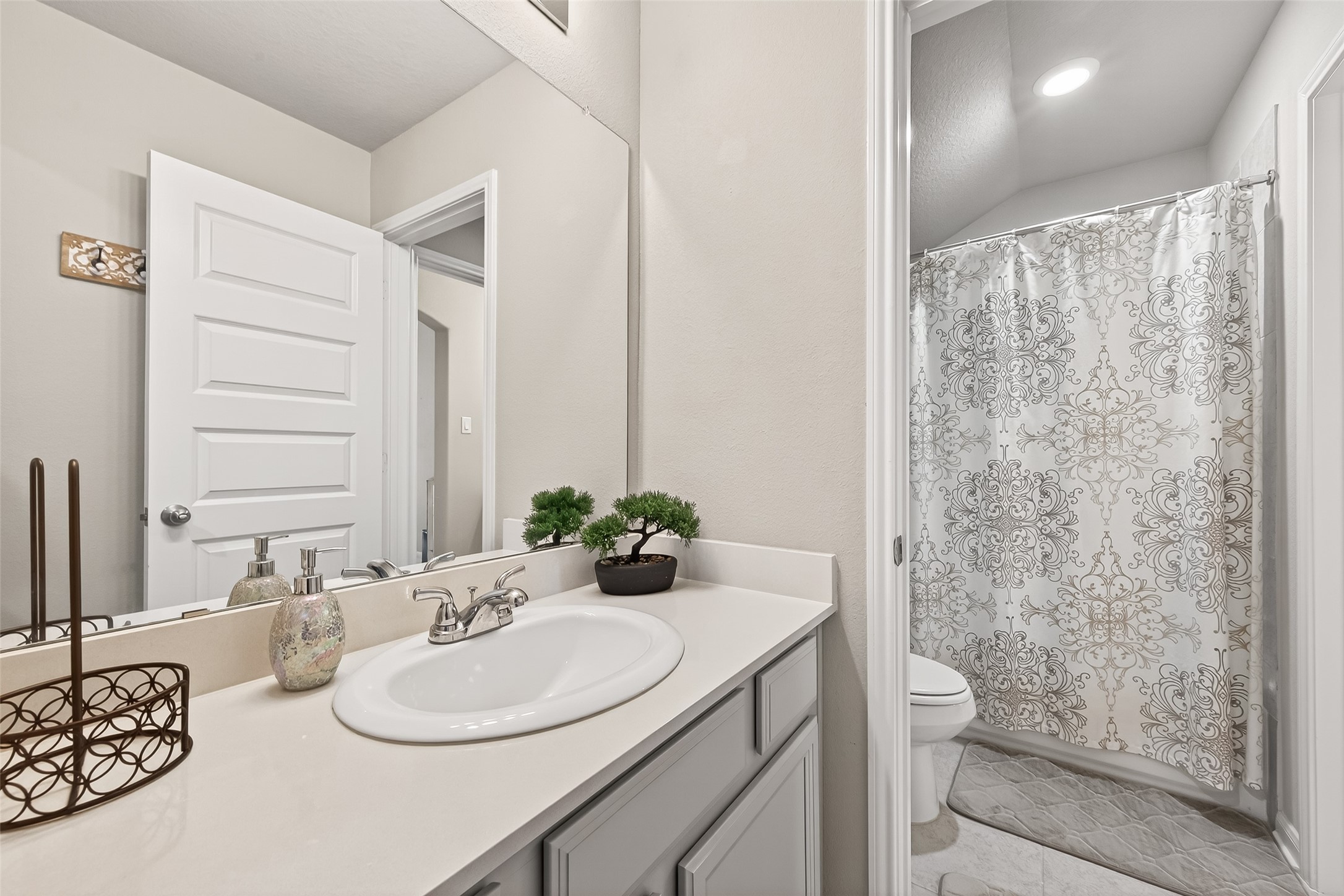 1122 Thyme Rise Lane Richmond, TX 77406 - Photo 43 of 50 a bathroom with a sink toilet and shower