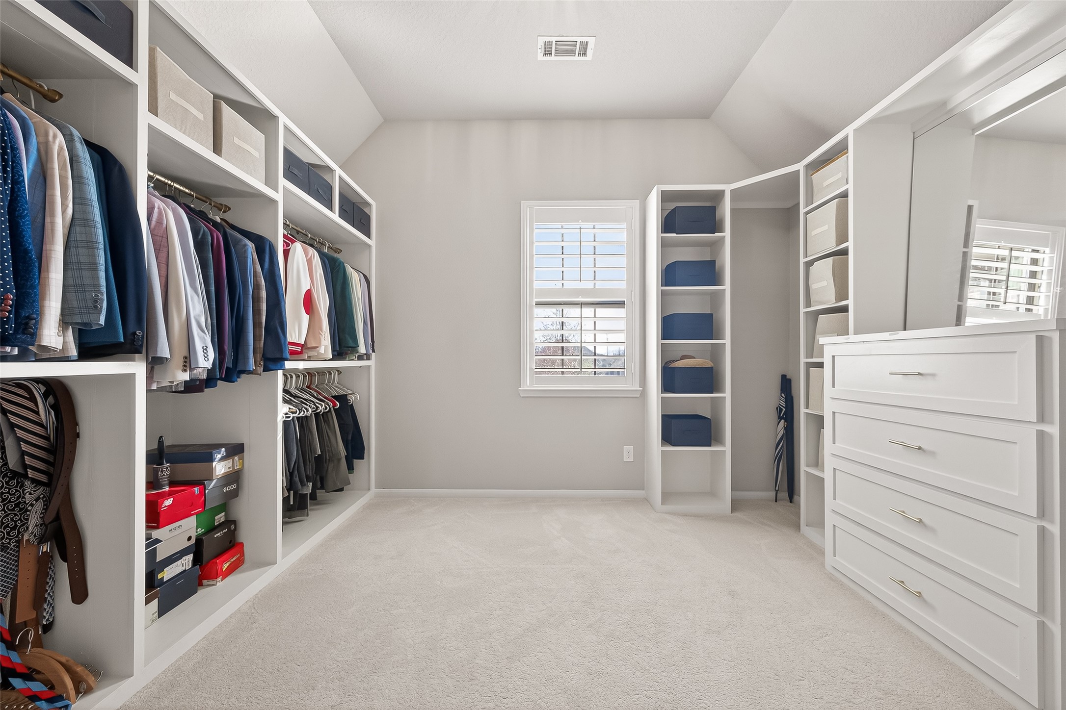 1122 Thyme Rise Lane Richmond, TX 77406 - Photo 44 of 50 a view of walk in closet with clothes and shoes