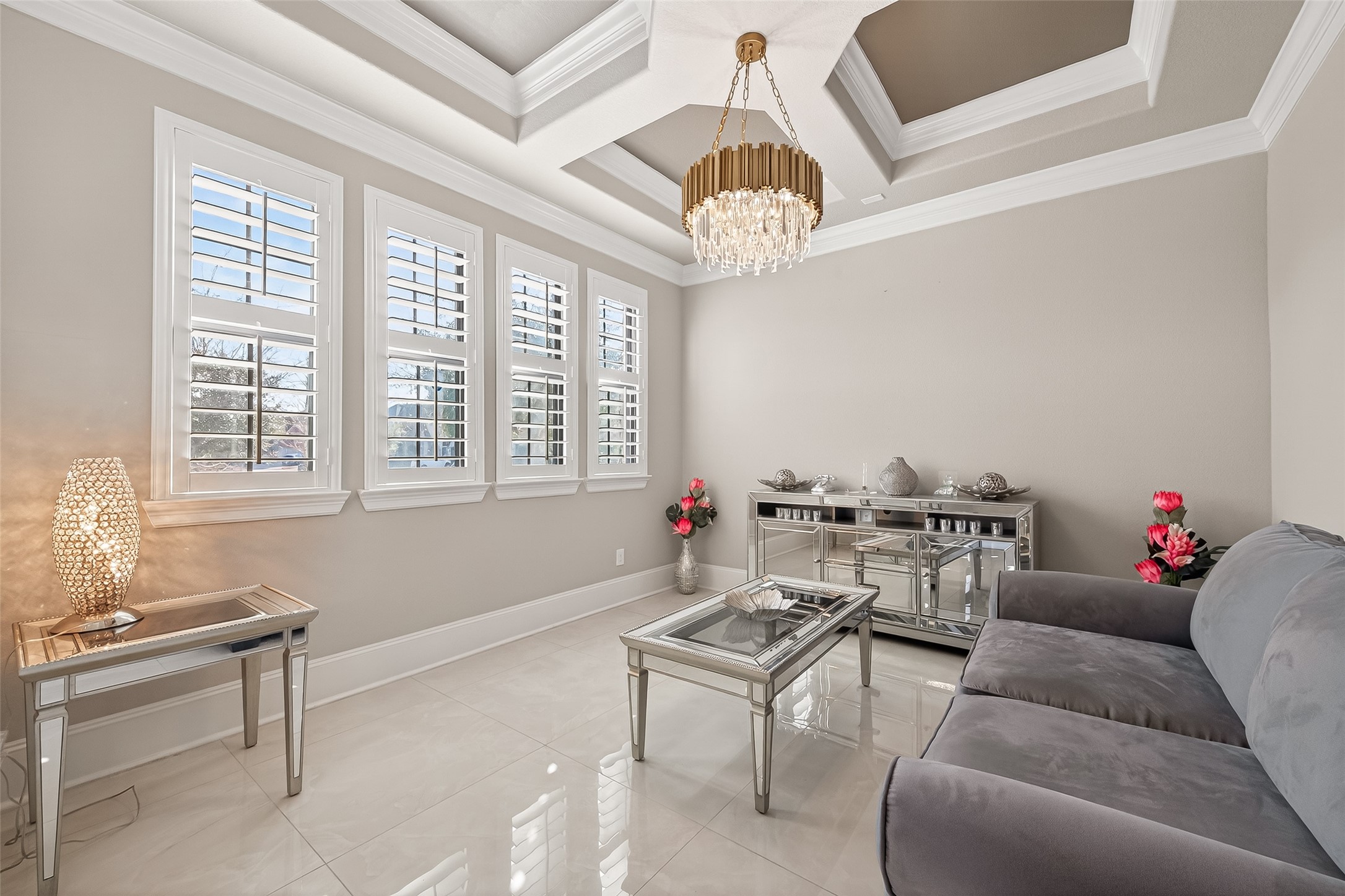 1122 Thyme Rise Lane Richmond, TX 77406 - Photo 8 of 50 a living room with furniture and a chandelier