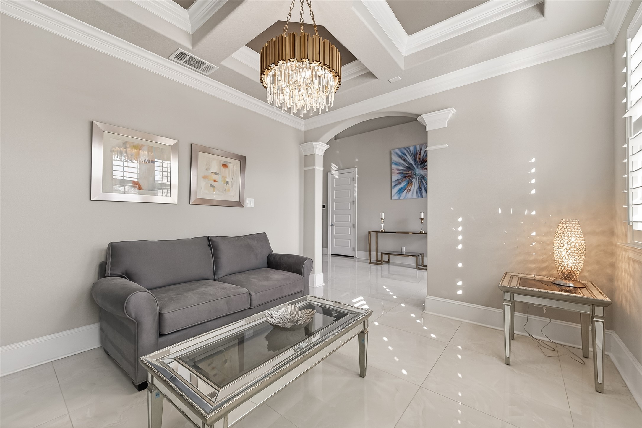 1122 Thyme Rise Lane Richmond, TX 77406 - Photo 9 of 50 a living room with furniture and a chandelier