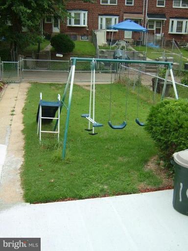 1628 Pentwood Road Baltimore, MD 21239 - Photo 4 of 9 Large rear yard with playset.